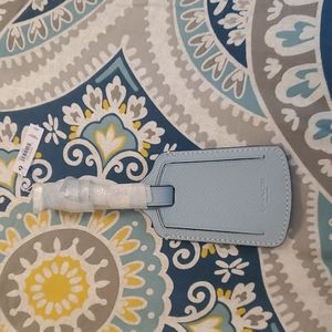 Coach luggage tag.